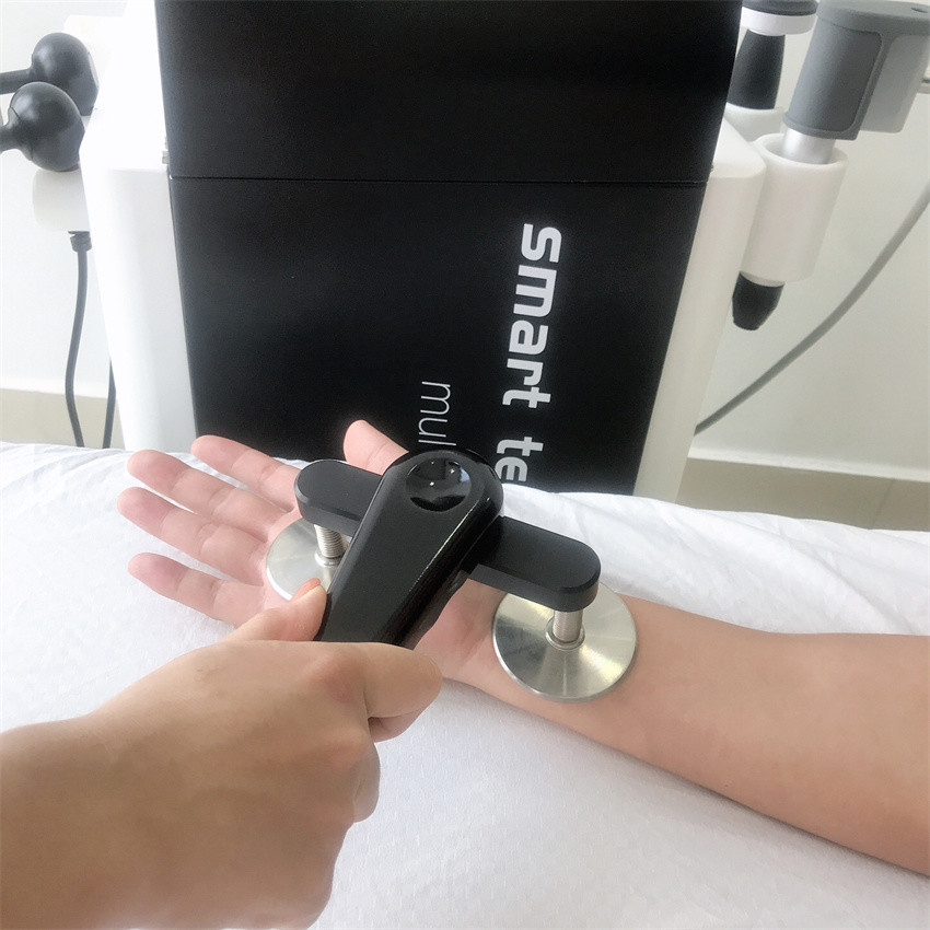 Maszyna do terapii ultradźwiękowej z wiadomością o fali uderzeniowej na ból mięśni zwichniętych kostek